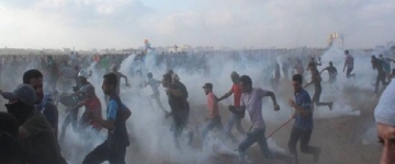 İsrail ordusu Qəzza zolağında bir fələstinlini qətlə yetirdi, yüzlərlə insanı yaraladı - Foto/VİDEO  