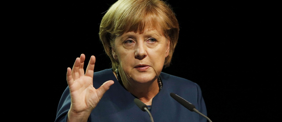 Merkel niqabı qadağa etməyə çağırıb